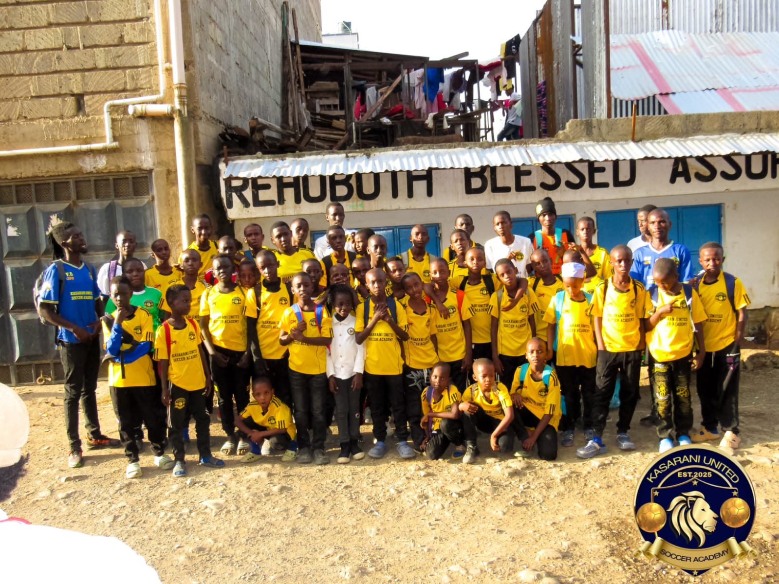 Children wearing donated sports gear